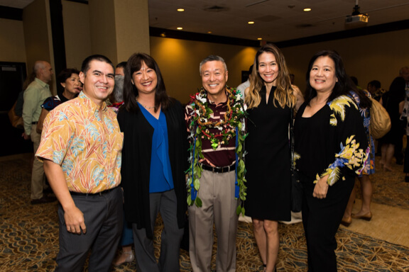Five attractive Shidler alumni pose for a quick snapshot at a previous Hall of Honor.