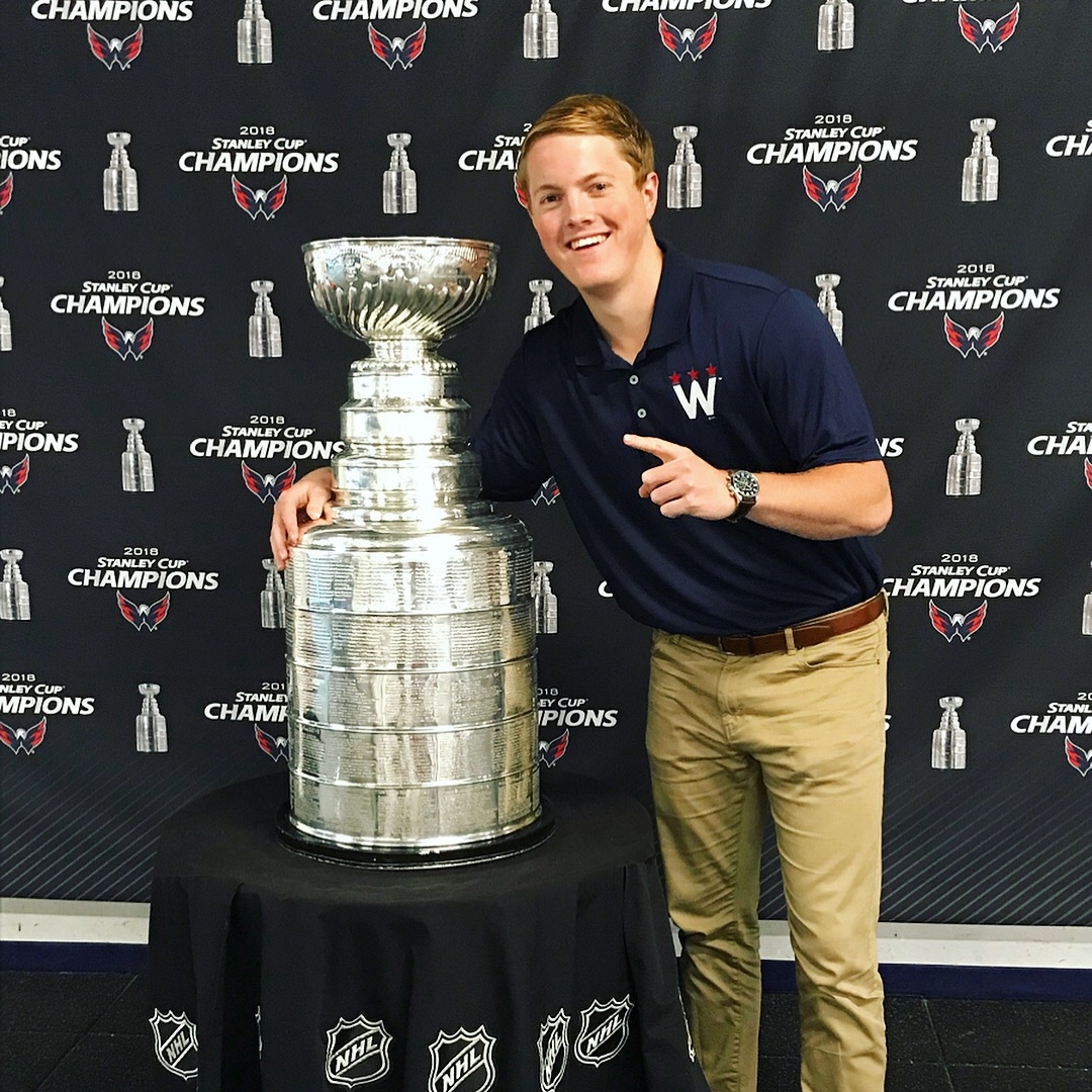Shidler business student John Hewer with the Stanley Cup.
