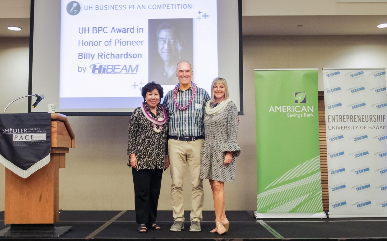 From left: HiBEAM Executive Director Bee Leng Chua, PACE Executive Director Peter Rowan, and Pineapple Tweed Founder and HiBEAM board member Piia Aarma announce a $25,000 HiBEAM award to support the "UH BPC in Honor of Billy Richardson.