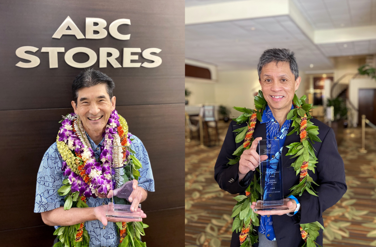 Paul Kosasa, president and CEO of ABC Stores and Glenn Vergara, BBA ‘84, vice president and general manager of the Waikiki Resort Hotel